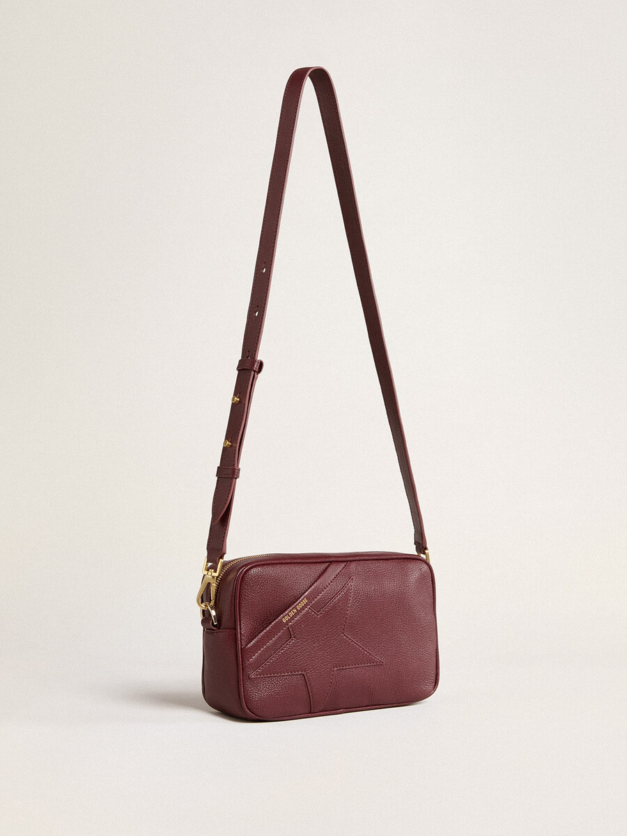 torebka star bag ze skóry w kolorze czerwonego wina z gwiazdą w tym samym kolorze