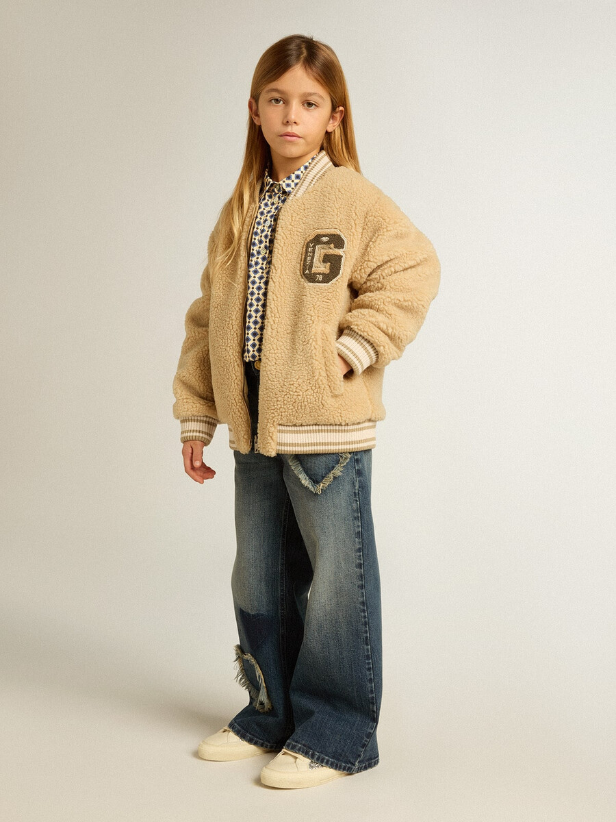 jeansy dziewczęce z szerokimi nogawkami w kolorze niebieskim denim