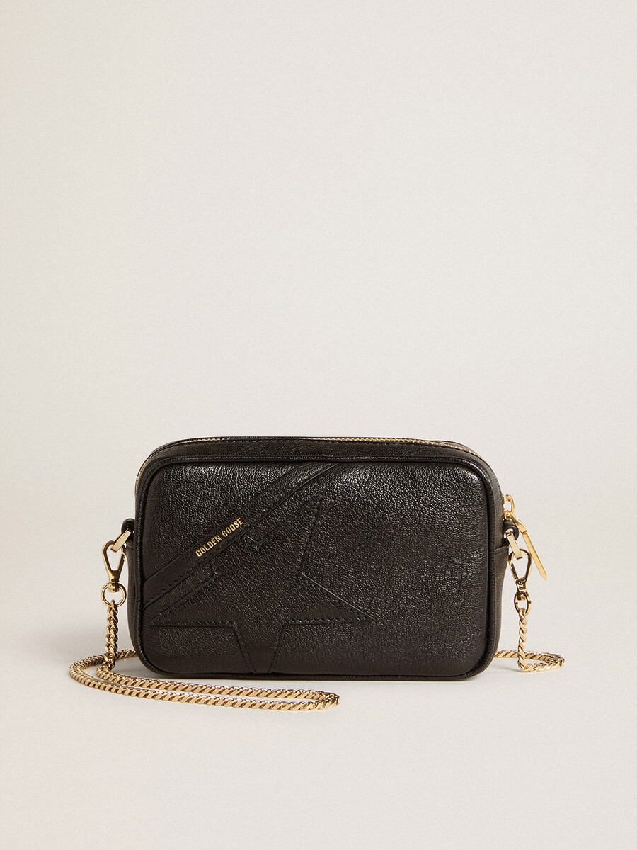 mini torebka star bag z czarnej skóry z gwiazdą w tym samym kolorze