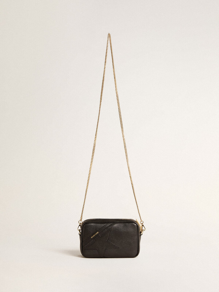 mini torebka star bag z czarnej skóry z gwiazdą w tym samym kolorze