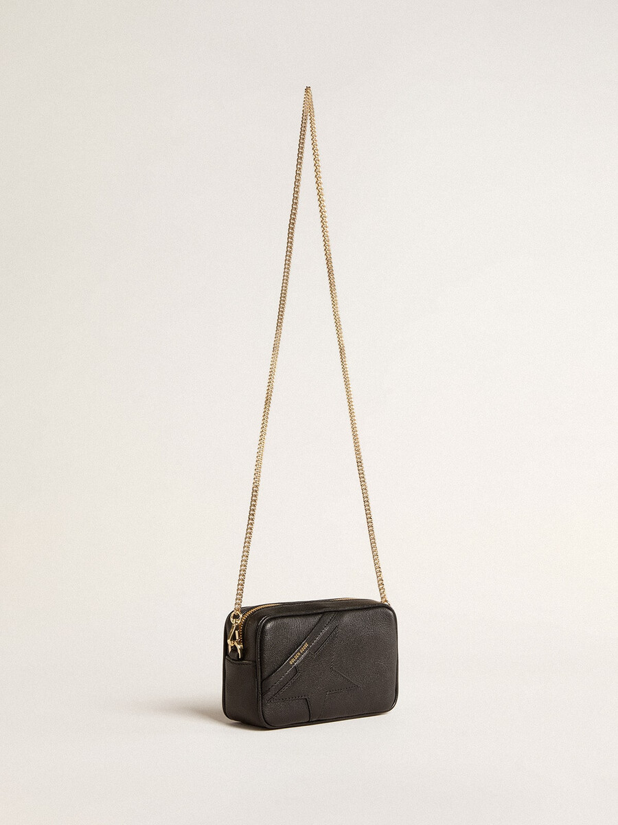 mini torebka star bag z czarnej skóry z gwiazdą w tym samym kolorze