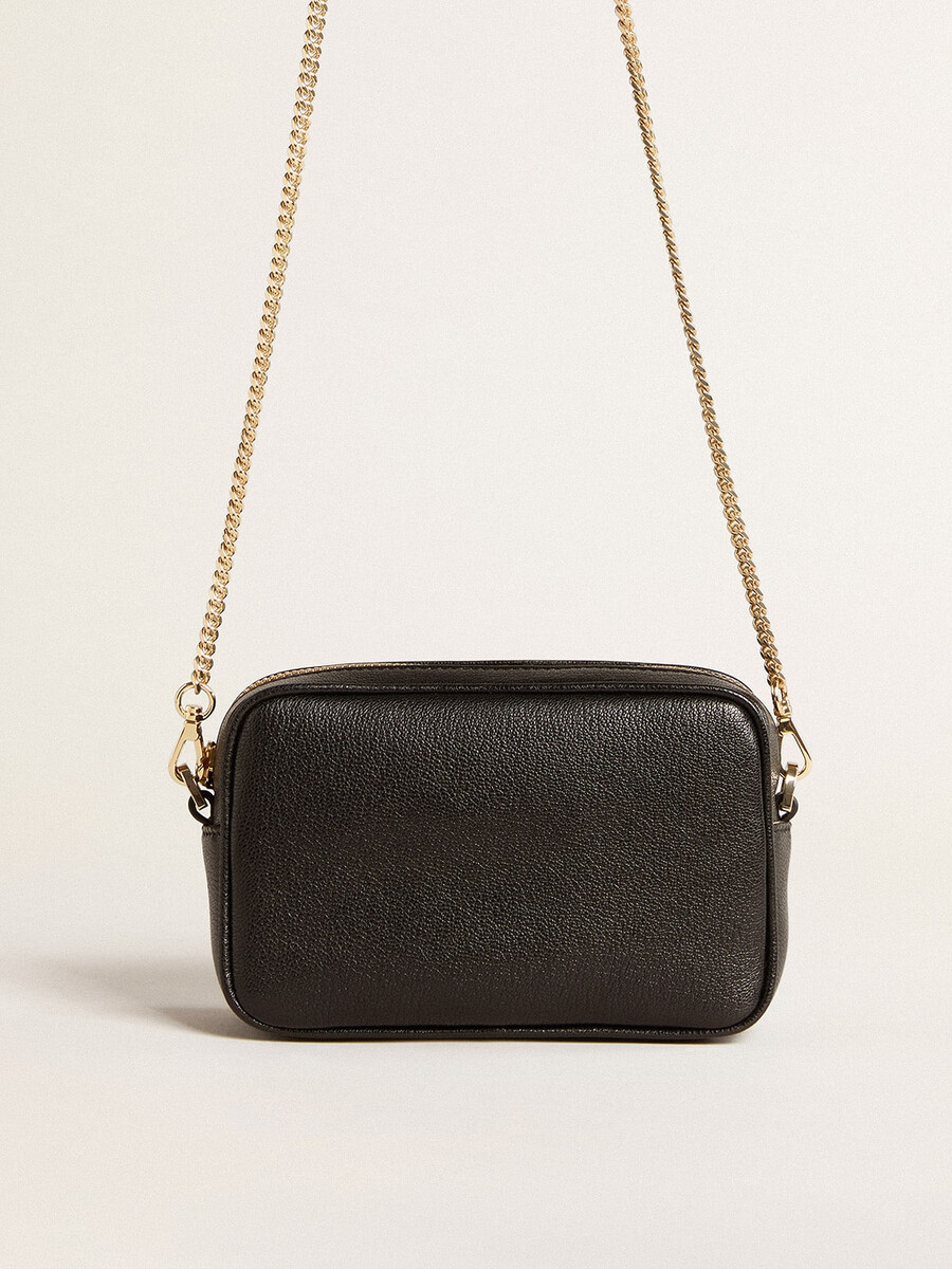 mini torebka star bag z czarnej skóry z gwiazdą w tym samym kolorze