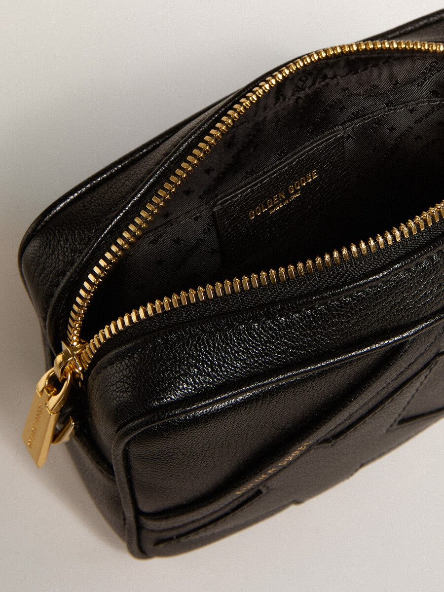 mini torebka star bag z czarnej skóry z gwiazdą w tym samym kolorze