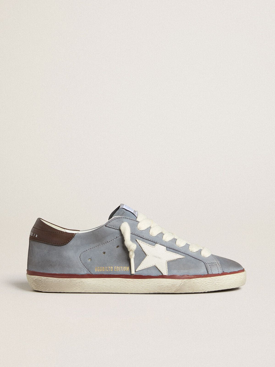 buty super-star ltd ze skóry nubukowej w kolorze jasnoniebieskim z białą gwiazdą ze skóry i brązowym skórzanym paskiem na pięcie