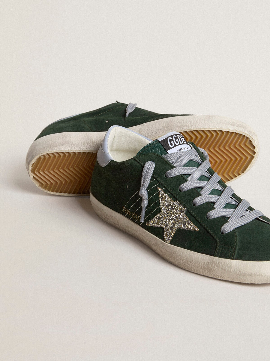 damskie buty super-star z zielonego zamszu ze srebrną brokatową gwiazdą i skórzanym paskiem na pięcie