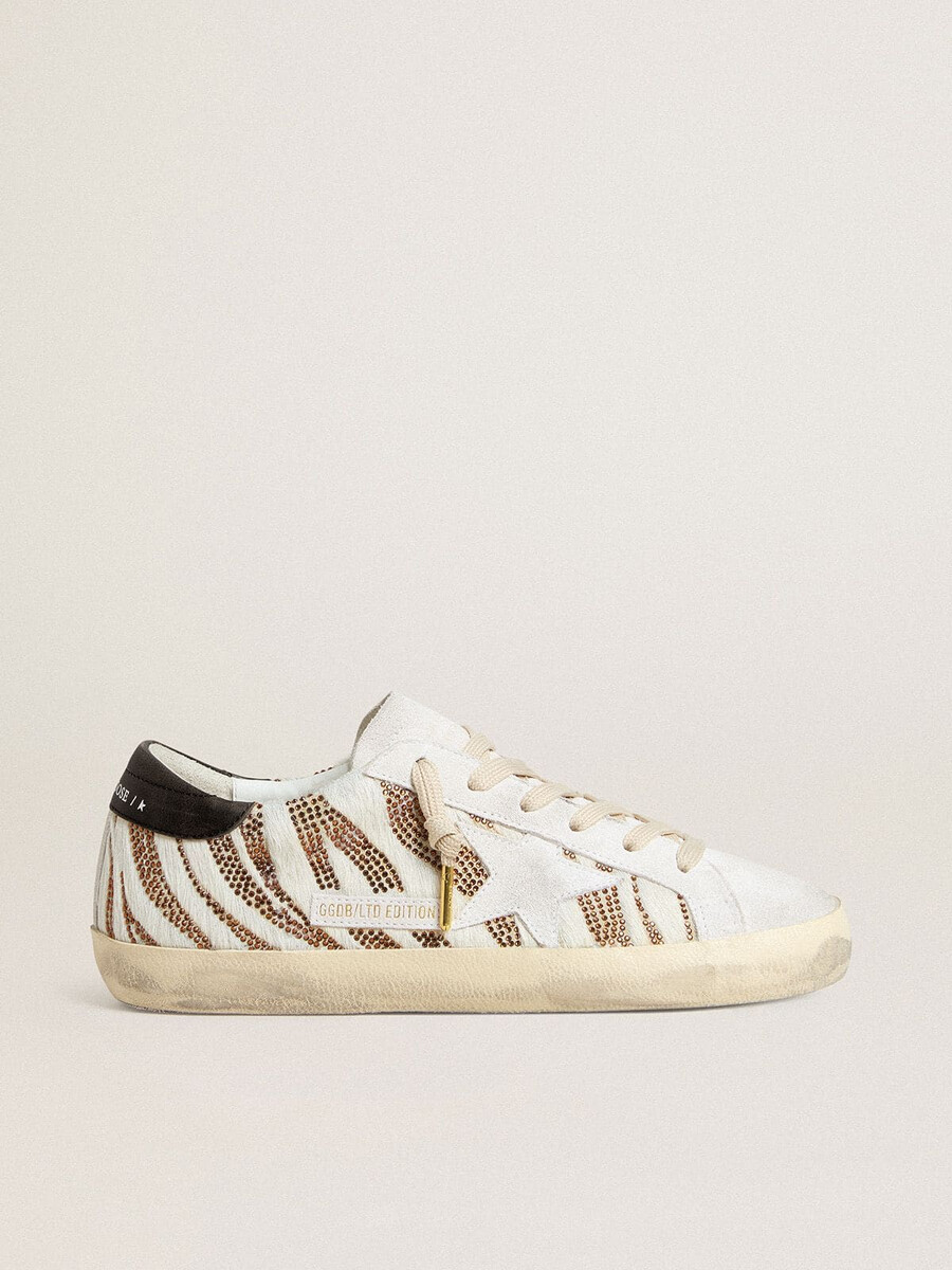 damskie buty super-star ltd w kolorze białym z motywem skóry kucyka z brązowym brokatem i białą zamszową gwiazdką