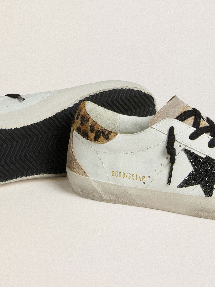 damskie buty super-star z czarną brokatową gwiazdą i zapięciem ze skóry kucyka z nadrukiem w panterkę