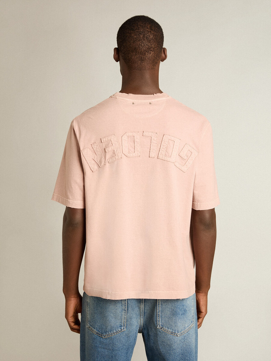 koszulka w kolorze pudrowego różu z odwróconym logo na plecach - jersey capsule